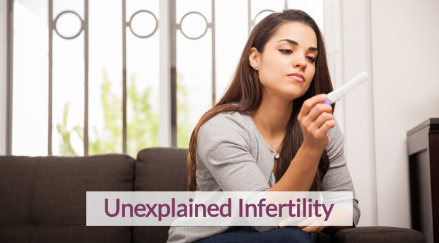 Disappointment woman looking at negative pregnancy test